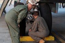 U.S. Air Force Col. Dan Hoadley, 5th Bomb Wing commander, conducts pre-flight checks of a B-52H Stratofortress with the Honorable Tom Ross, mayor of Minot, North Dakota, at Minot Air Force Base, North Dakota, Sept. 6, 2023.  Pre- flight checks ensure that everything on the jet is operational before it takes off. (U.S. Air Force Photo by Airman 1st Class Alexander Nottingham)