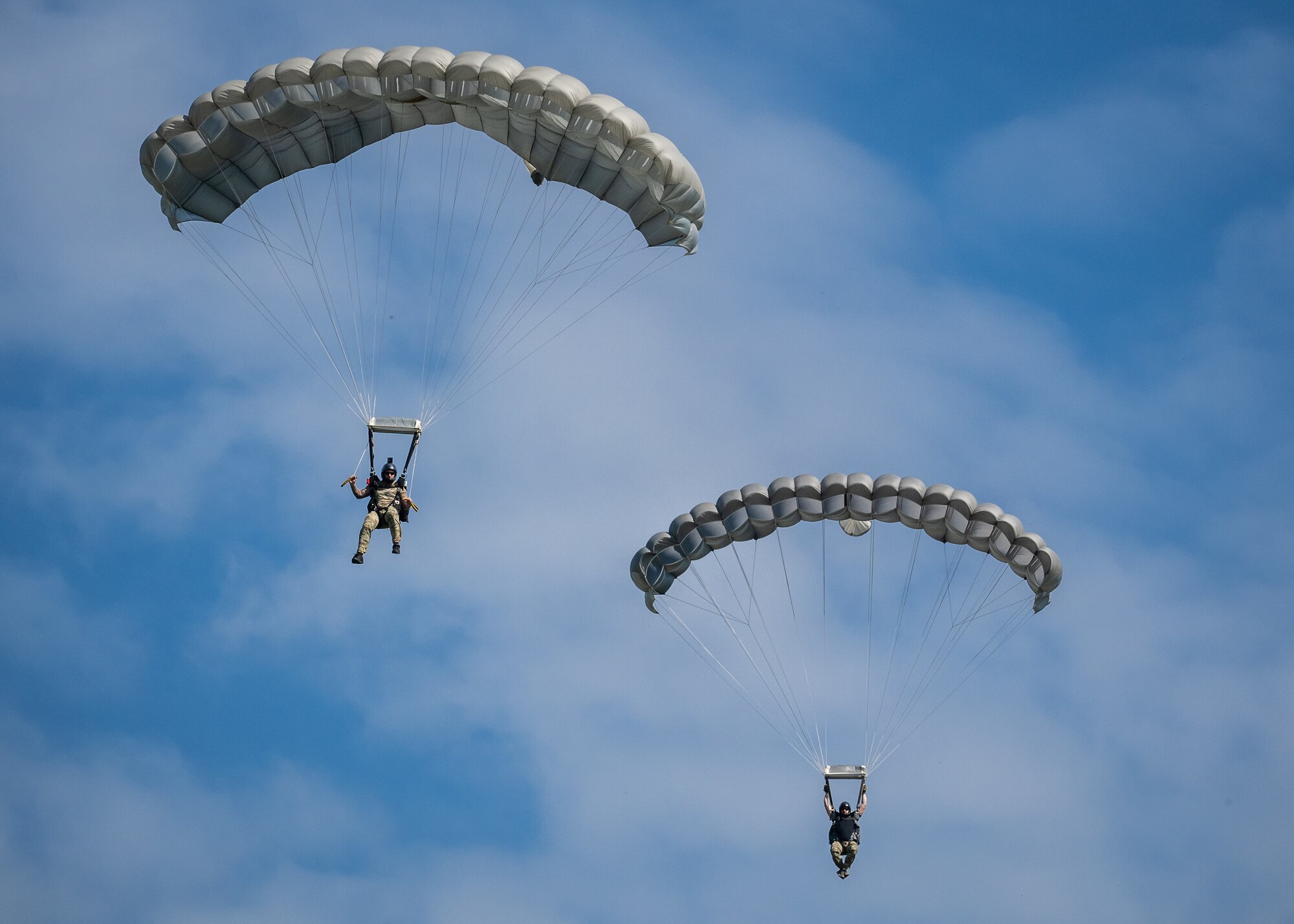 U.S. Air Force pararescuemen execute precision parachute landings at Freeman Municipal Airport in Seymour, Ind., Sept. 4, 2023, as part of the PJ Rodeo. The biennial event, which tests the capabilities of pararescue Airmen across the service, was hosted by the Kentucky Air National Guard’s 123rd Special Tactics Squadron. (U.S. Air National Guard photo by Dale Greer)
