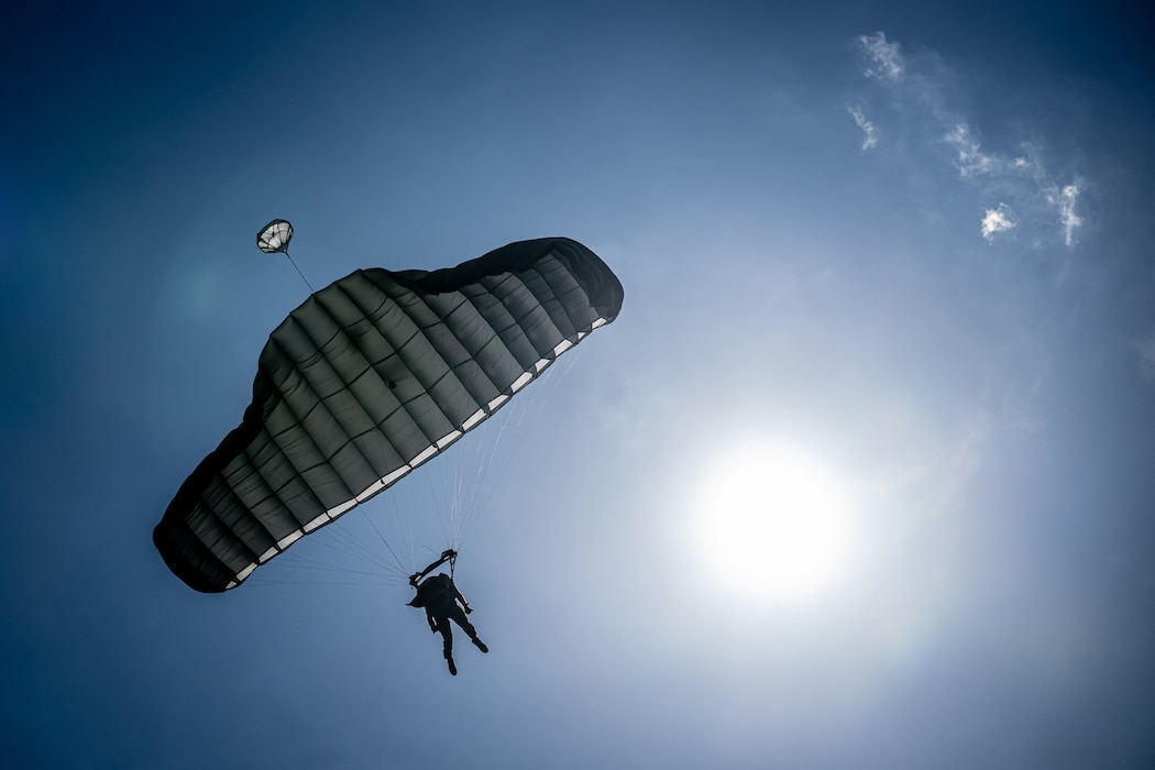 A U.S. Air Force pararescueman executes a precision parachute landing at Freeman Municipal Airport in Seymour, Ind., Sep. 4, 2023, as part of the 2023 PJ Rodeo. The biennial event, which tests the capabilities of pararescue Airmen across the service, was hosted by the Kentucky Air National Guard’s 123rd Special Tactics Squadron. (U.S. Air National Guard photo by Dale Greer)