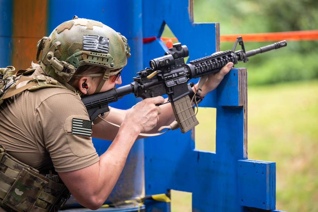 A U.S. Air Force pararescueman completes a timed marksmanship course in Elizabeth, Ind., Sept. 5, 2023, as part of the 2023 PJ Rodeo competition. The biennial event, which tests the capabilities of pararescue Airmen across the service, was hosted by the Kentucky Air National Guard’s 123rd Special Tactics Squadron. (U.S. Air National Guard photo by Dale Greer)