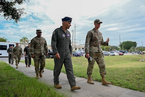 Lt. Gen. Brian Robinson tours the 33rd Fighter Wing