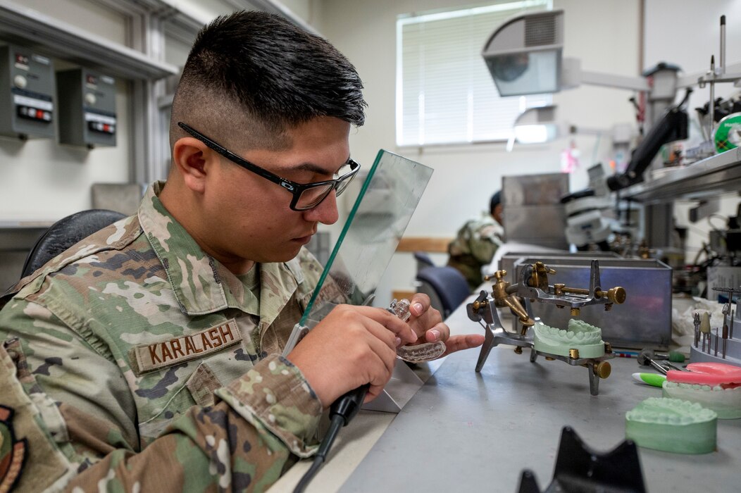 U.S. Air Force Senior Airman Tristan Karalash, 51st Operational Medical Readiness Squadron dental flight lab technician, works on a nightguard at Osan Air Base, Republic of Korea, Sep. 6, 2023.