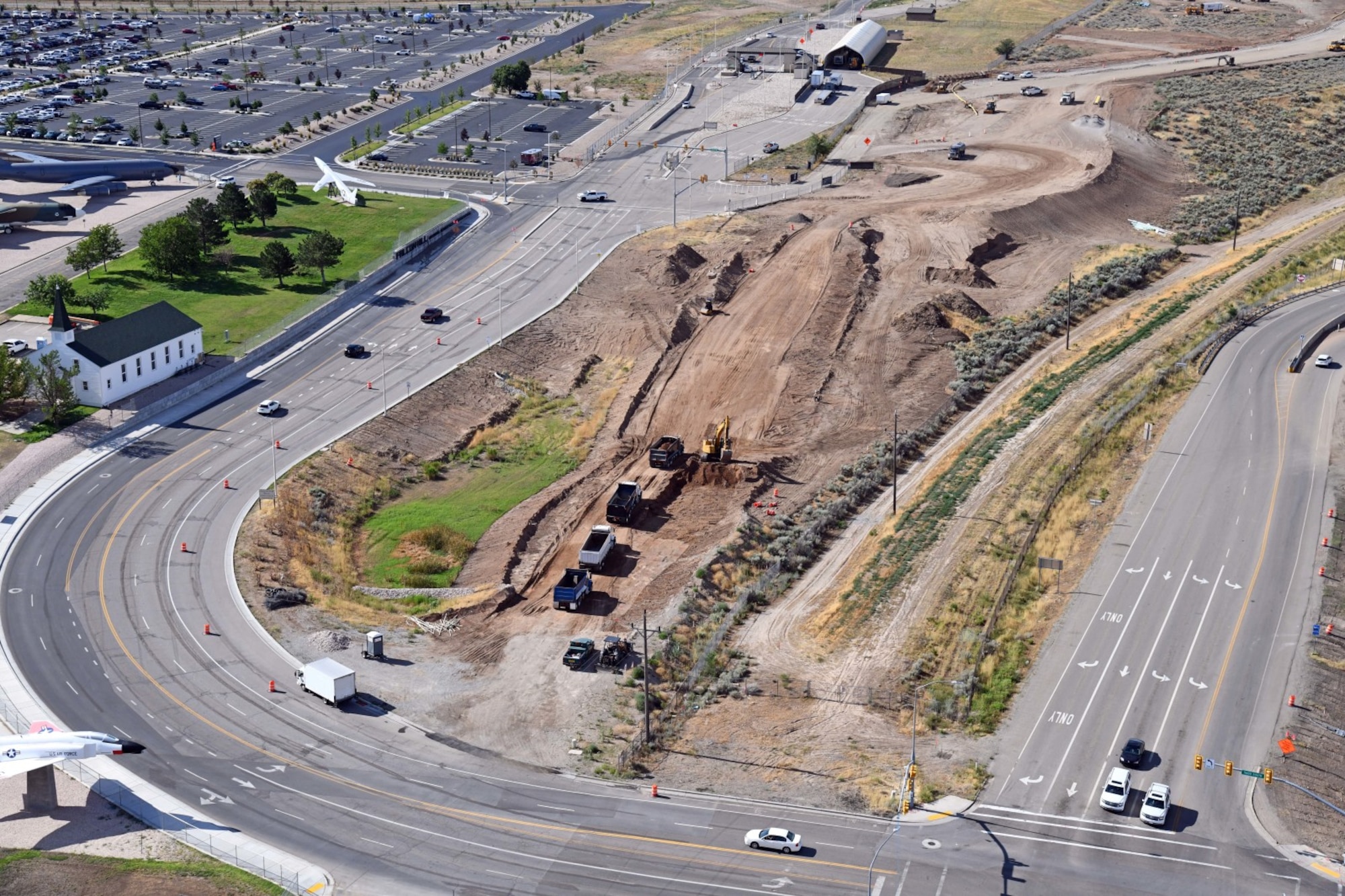 An aerial shot of construction occurring at the 5600 South and I-15 interchange near Hill's Roy Gate.