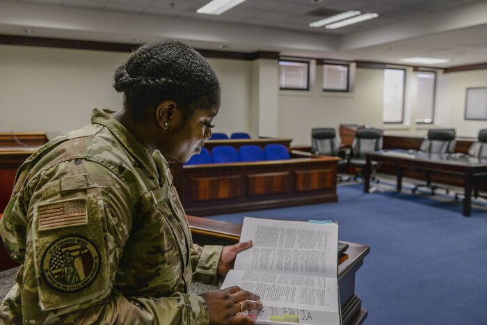 Woman studying UCMJ