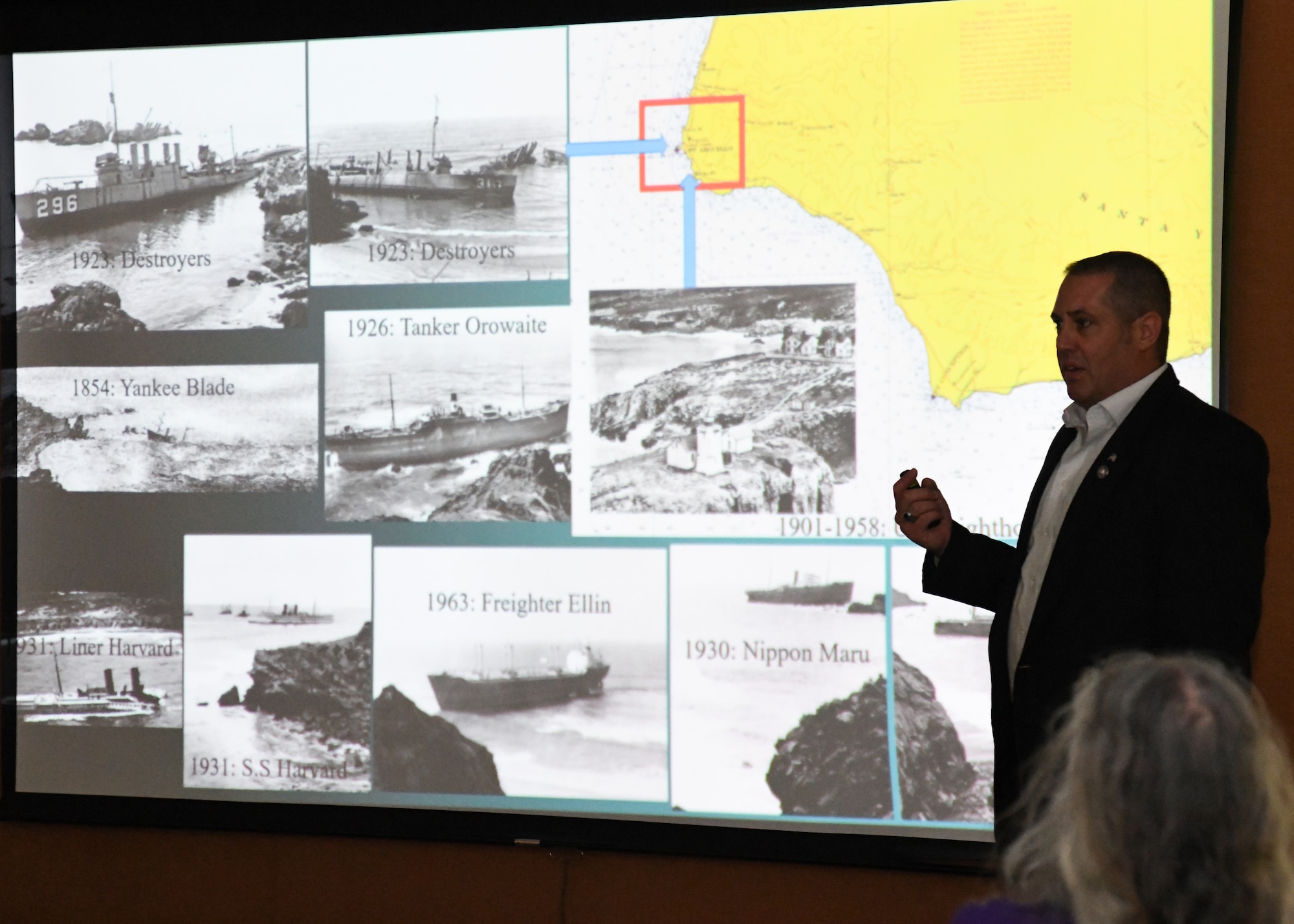 During a presentation held at the base library on Sept. 7, 2023, Dr. Scott Bailey, deputy command historian for Space Operations Command, and former Space Launch Delta 30 historian, shed light on the historical context and significance of the Honda Point shipwreck tragedy. This devastating incident unfolded off the base's coastline where seven U.S. Navy destroyers ran aground at Honda Point, resulting in the tragic loss of 23 sailors' lives. On Sept. 8, 2023, the base commemorated the 100th anniversary of the tragedy by lowering the flags to half-staff and playing Taps at 9:05 p.m., aligning with the precise moment of the disaster. (U.S. Space Force photo by Senior Airman Rocio Romo)