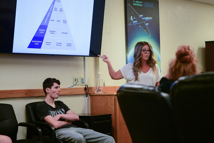 Anne Noll, 9th Force Support Squadron Military and Family Readiness community readiness consultant, teaches a finance class to Airmen on Aug. 28, 2023, on Beale Air Force Base, California.