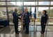 Air Force commander poses with guidon