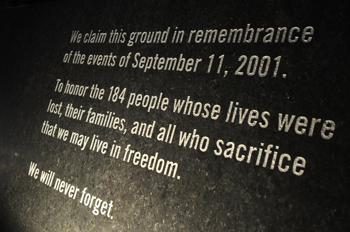 A marker at the National 9/11 Pentagon Memorial serves as a reminder of the 9/11 attack on the Pentagon.