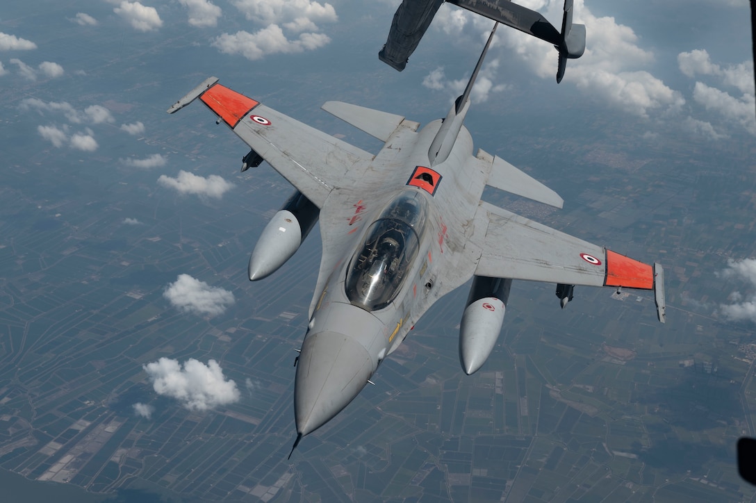 An Egyptian Air Force F-16 Fighting Falcon departs a U.S. Air Force KC-10 Extender assigned to the 908th Expeditionary Air Refueling Squadron after practicing aerial refueling during Exercise Bright Star 23 over Egypt, Sept. 4, 2023. Bright Star 2023 is a multilateral U.S. Central Command exercise held with the Arab Republic of Egypt across air, land and sea domains that promotes and enhances regional security and cooperation, and improves interoperability in irregular warfare against hybrid threat scenarios. (U.S. Air Force photo by Staff Sgt. Emily Farnsworth)