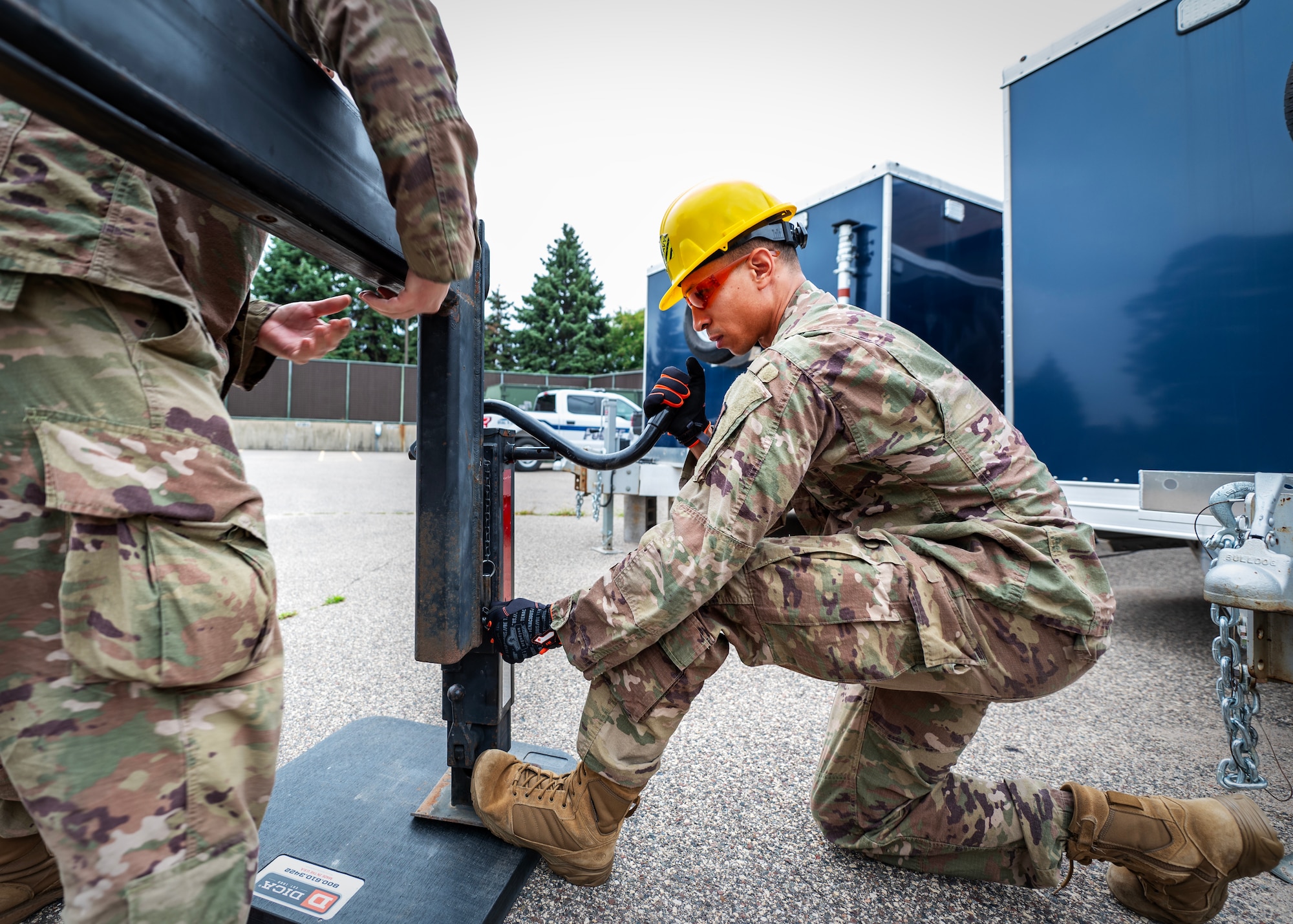 U.S. Air Force Staff Sgt. Duvaughn Schroeder, 210th Engineering Installation Squadron, adjusts one of the four stabilizers on the Remote Communication Platform (RCP) in St. Paul, Aug., Minn., 6, 2023.