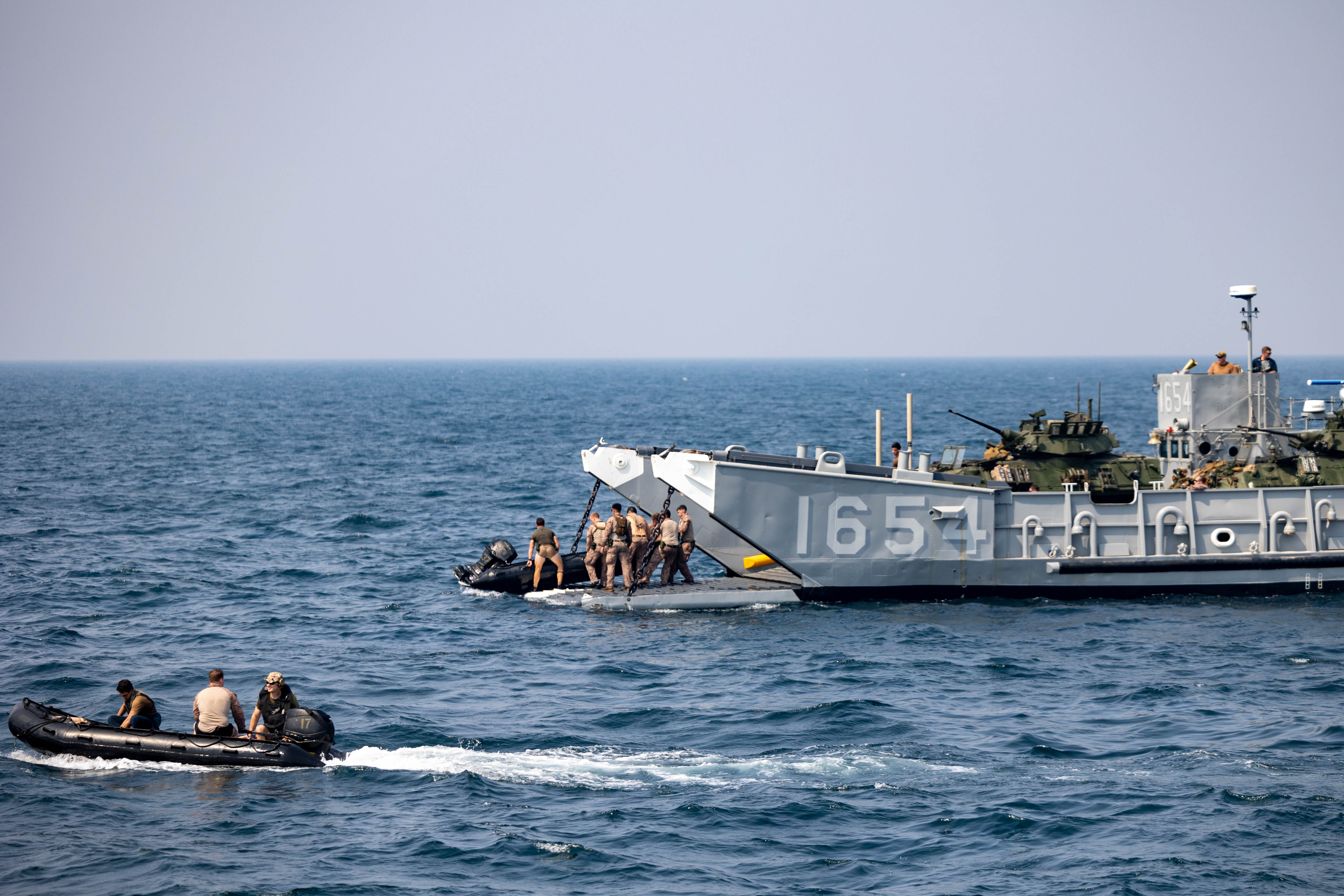 Marines assigned to the 26th Marine Expeditionary Unit (MEU) and U.S. Naval Special Warfare Operators assigned to Special Operations Joint Task Force-Central conduct small boat training in the Arabian Gulf, Sept. 5, 2023.
