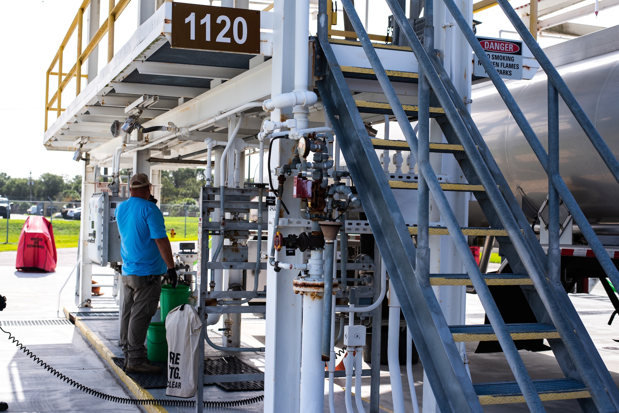 Brian Sutton, SIEGE enterprises fuel distribution system operator, operates the fuel pump at MacDill Air Force Base, Florida, August 22, 2023.