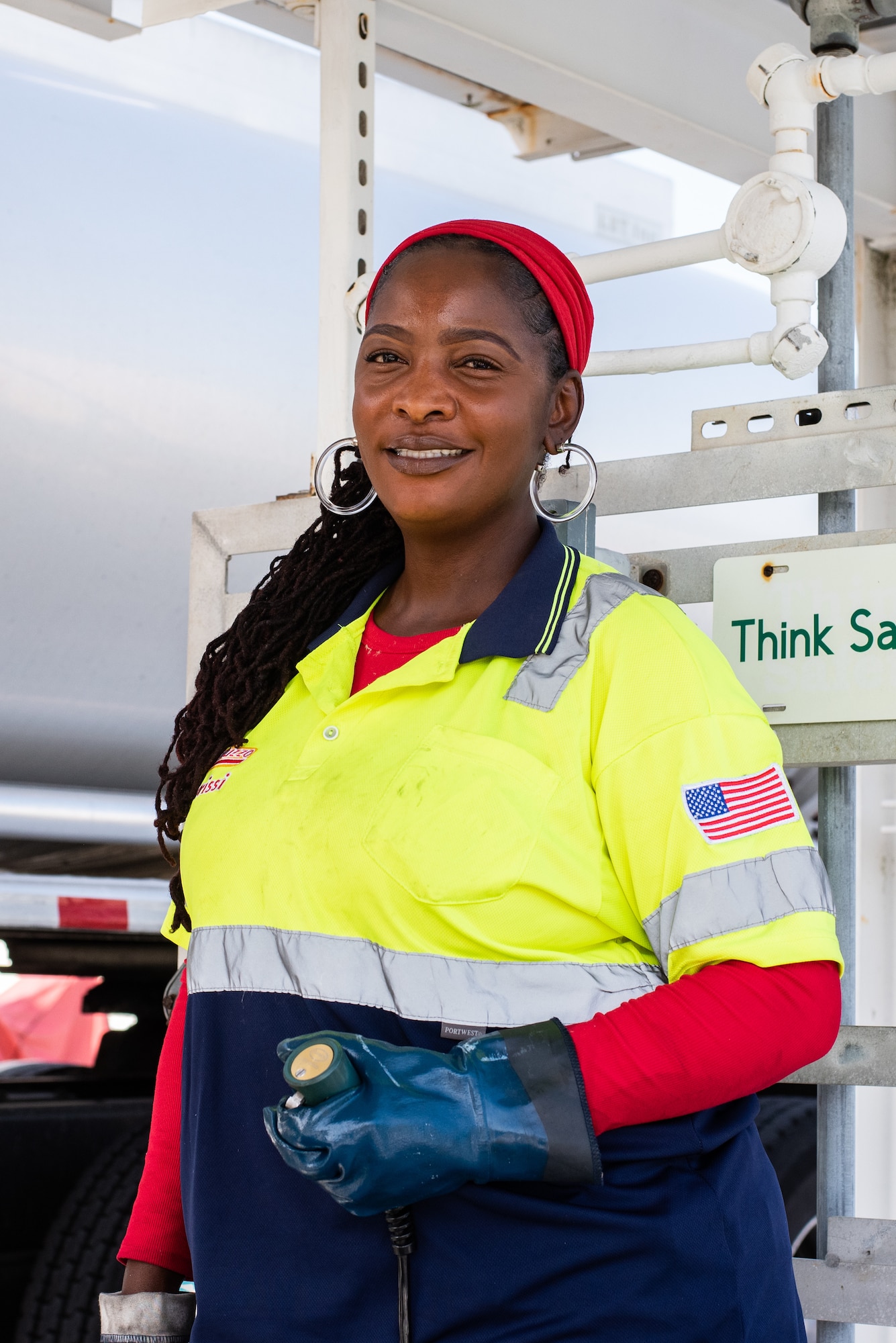 Yolanda Bush, Torrissi petroleum company transporter operator, prepares to load Jet A fuel onto a fuel tanker truck from the fuel supply tanks at MacDill Air Force Base, Florida, August 22, 2023.