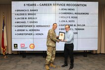Forty-one SWG employees marked their anniversaries of federal employment at the one, five, 10, 15, 20-, 30-, 35- and 40-year points.