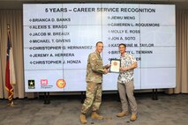 Forty-one SWG employees marked their anniversaries of federal employment at the one, five, 10, 15, 20-, 30-, 35- and 40-year points.