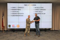Spencer received his award for volunteering with the SWG Corps Day recreation committee.