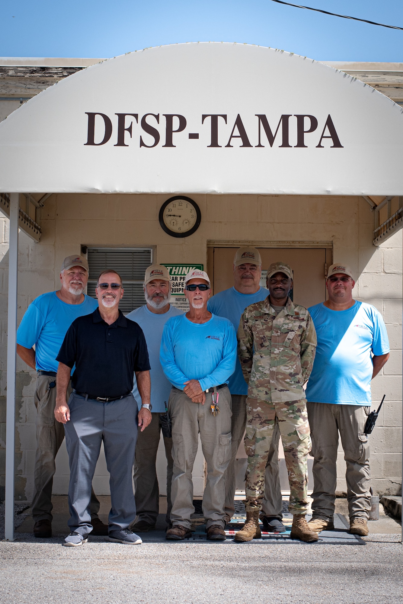 Personnel assigned to the Defense Fuel Support Point (DFSP) Tampa pose for a photo at MacDill Air Force Base, Florida, August 22, 2023.