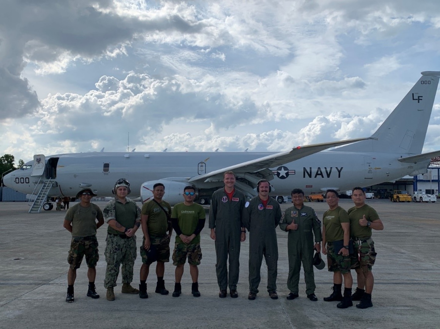230824-N-XF249-0001 MACTAN, Philippines (Aug. 24, 2023) Crewmembers assigned to the “War Eagles” of Patrol Squadron (VP) 16 and personnel from the Philippine Navy pose in front of a U.S. P-8A during the multilateral exercise SEACAT 23 in Mactan, Aug. 24, 2023. SEACAT 23 is an exercise designed to train U.S. and regional partners for ‘real world, real time’ engagement and enhance their ability to communicate, coordinate and counter non-traditional maritime threats. The VP-16 “War Eagles” are based in Jacksonville, Florida, and are currently forward deployed to Kadena Air Base, Japan. The squadron conducts maritime patrol and reconnaissance as part of a rotational deployment to the U.S. 7th Fleet area of operations. (U.S. Navy photo by Chief Aviation Electrician’s Mate Jason King)