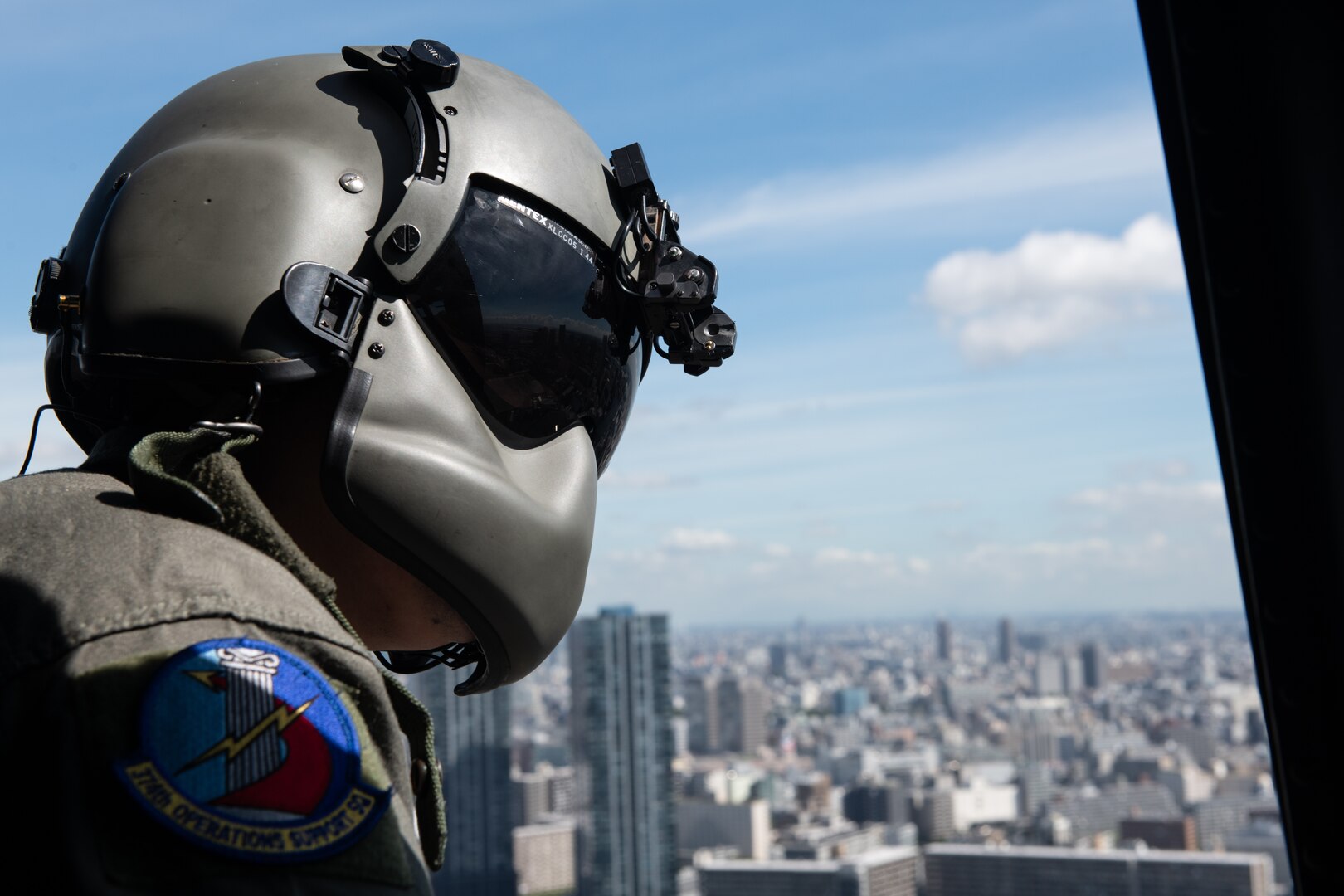 A U.S. Air Force airmen surveys Tokyo airspace.