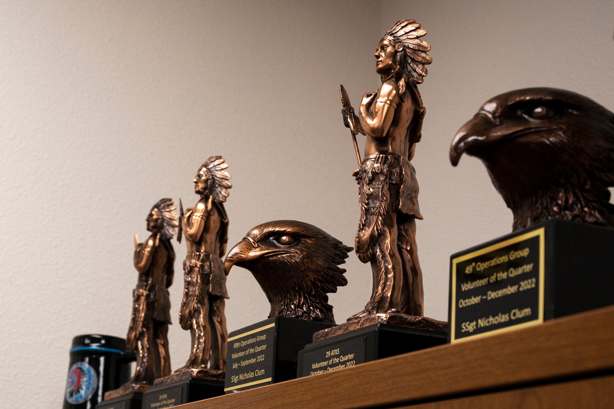 A series of awards achieved by U.S. Air Force Staff. Sgt. Nicholas Clum, 314th Fighter Squadron aviation resource management noncommissioned officer in charge, during his time in the service at Holloman Air Force Base, New Mexico, Aug. 29, 2023. From the earliest stages of mission planning to the return of the aircraft and crew, SARMs serve as those responsible for ensuring airborne operations are executed efficiently and safely. (U.S. Air Force photo by Airman 1st Class Isaiah Pedrazzini)