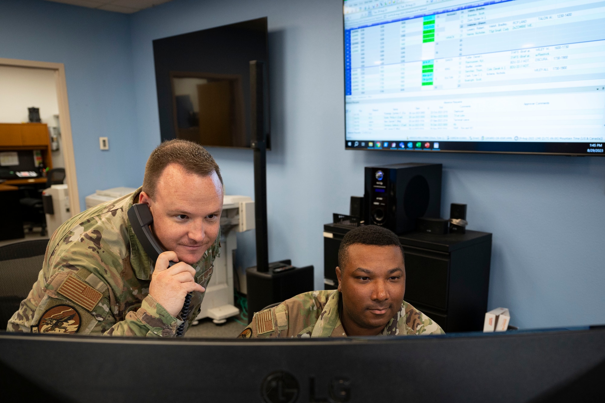 U.S. Air Force Staff. Sgt. Nicholas Clum, 314th Fighter Squadron aviation resource management noncommissioned officer in charge, left, and Senior Airman Dominic Hafeez, 54th Operations Support Squadron weather journeyman, monitor an expected weather forecast at Holloman Air Force Base, New Mexico, Aug. 29, 2023. From the earliest stages of mission planning to the return of the aircraft and crew, SARMs serve as those responsible for ensuring airborne operations are executed efficiently and safely. (U.S. Air Force photo by Airman 1st Class Isaiah Pedrazzini)