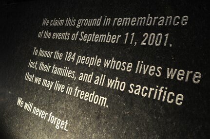 A marker at the National 9/11 Pentagon Memorial serves as a reminder of the 9/11 attack on the Pentagon.