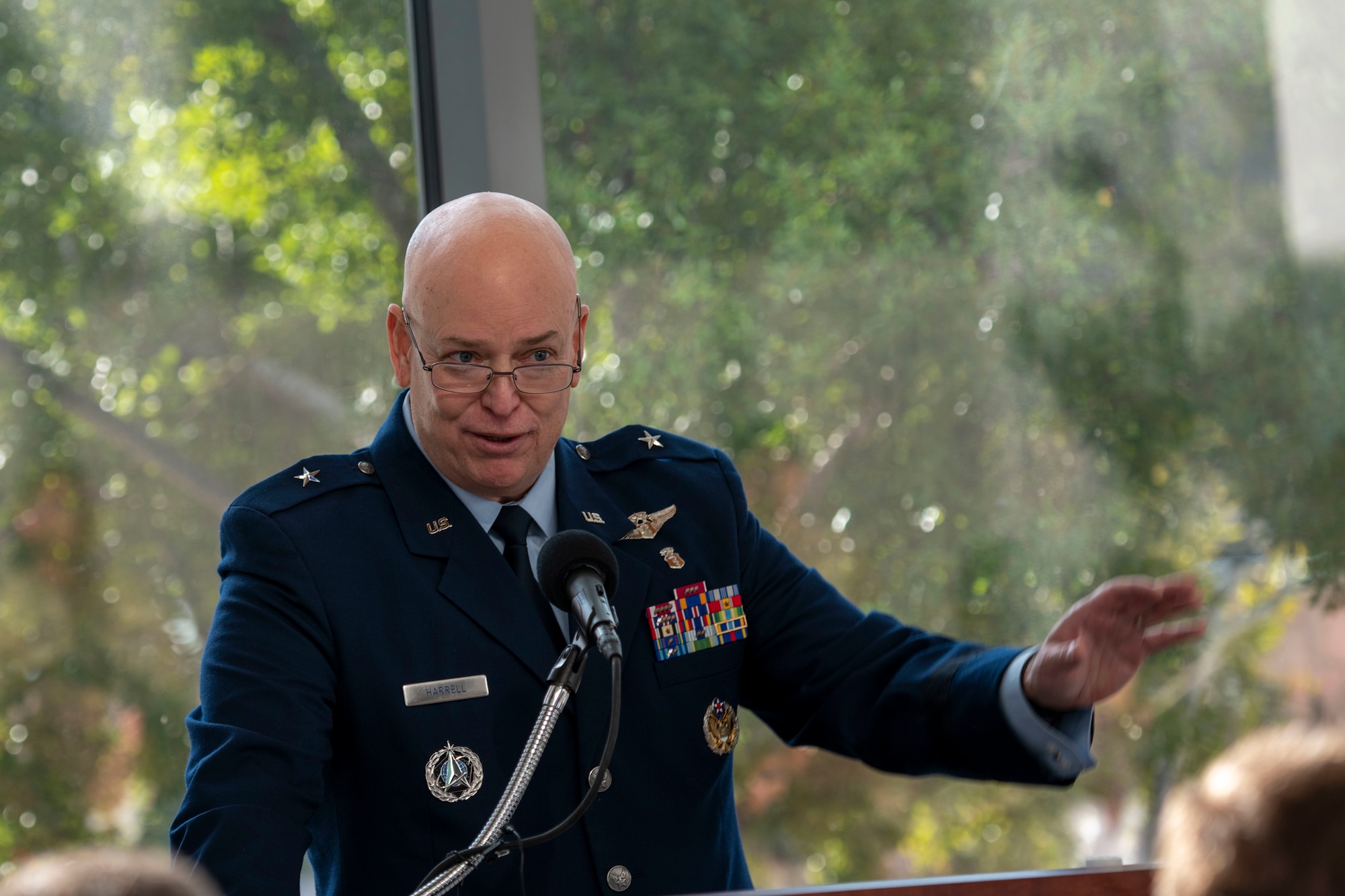 Air Force medical commander at podium