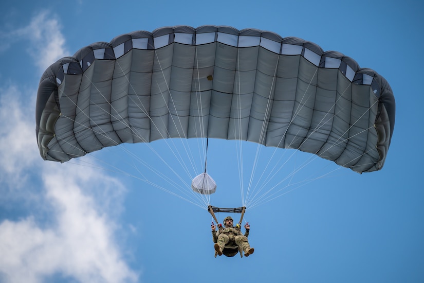 A U.S. Air Force pararescueman executes a precision parachute landing at Freeman Municipal Airport in Seymour, Ind., Sept. 4, 2023, as part of the 2023 PJ Rodeo. The biennial event, which tests the capabilities of pararescue Airmen across the service, was hosted by the Kentucky Air National Guard’s 123rd Special Tactics Squadron. (U.S. Air National Guard photo by Dale Greer)