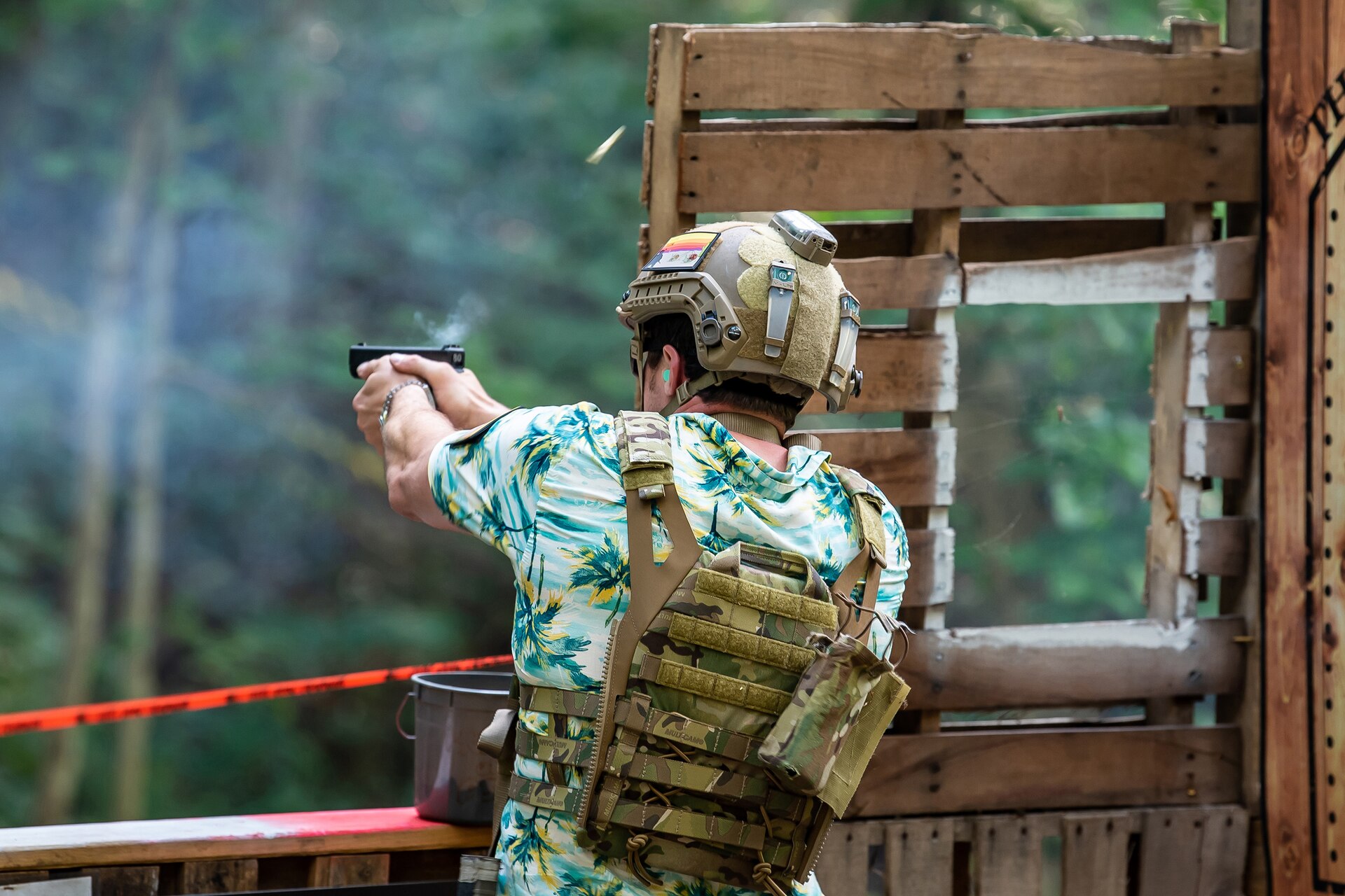 A U.S. Air Force pararescueman discharges his weapon during a marksmanship challenge in Elizabeth, Ind., Sept. 5, 2023, as part of the PJ Rodeo. The biennial event, which tests the capabilities of pararescue Airmen across the service, was hosted by the Kentucky Air National Guard’s 123rd Special Tactics Squadron. (U.S. Air National Guard photo by Senior Airman Madison Beichler)