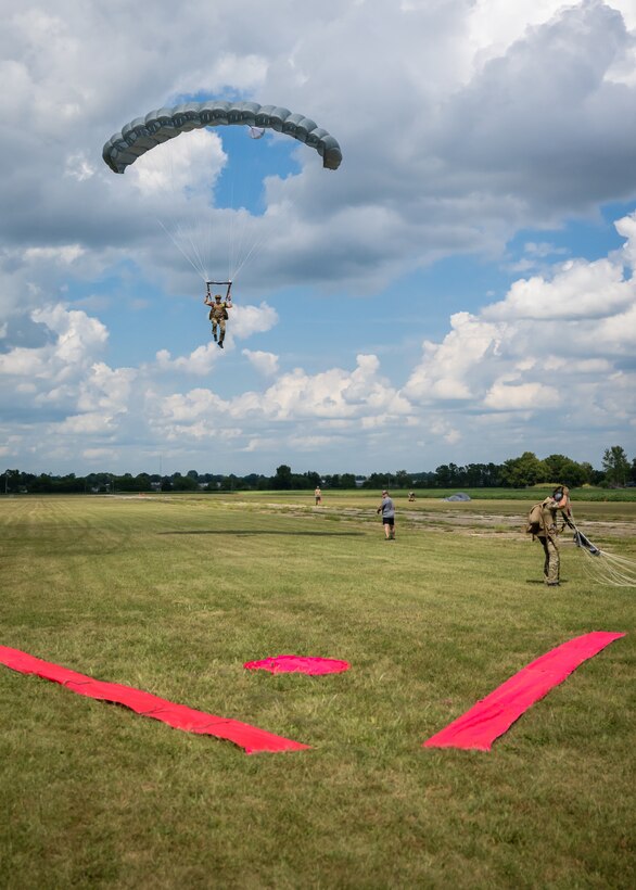 A U.S. Air Force pararescueman executes a precision parachute landing at Freeman Municipal Airport in Seymour, Ind., Sept. 4, 2023, as part of the 2023 PJ Rodeo. The biennial event, which tests the capabilities of pararescue Airmen across the service, was hosted by the Kentucky Air National Guard’s 123rd Special Tactics Squadron. (U.S. Air National Guard photo by Dale Greer)