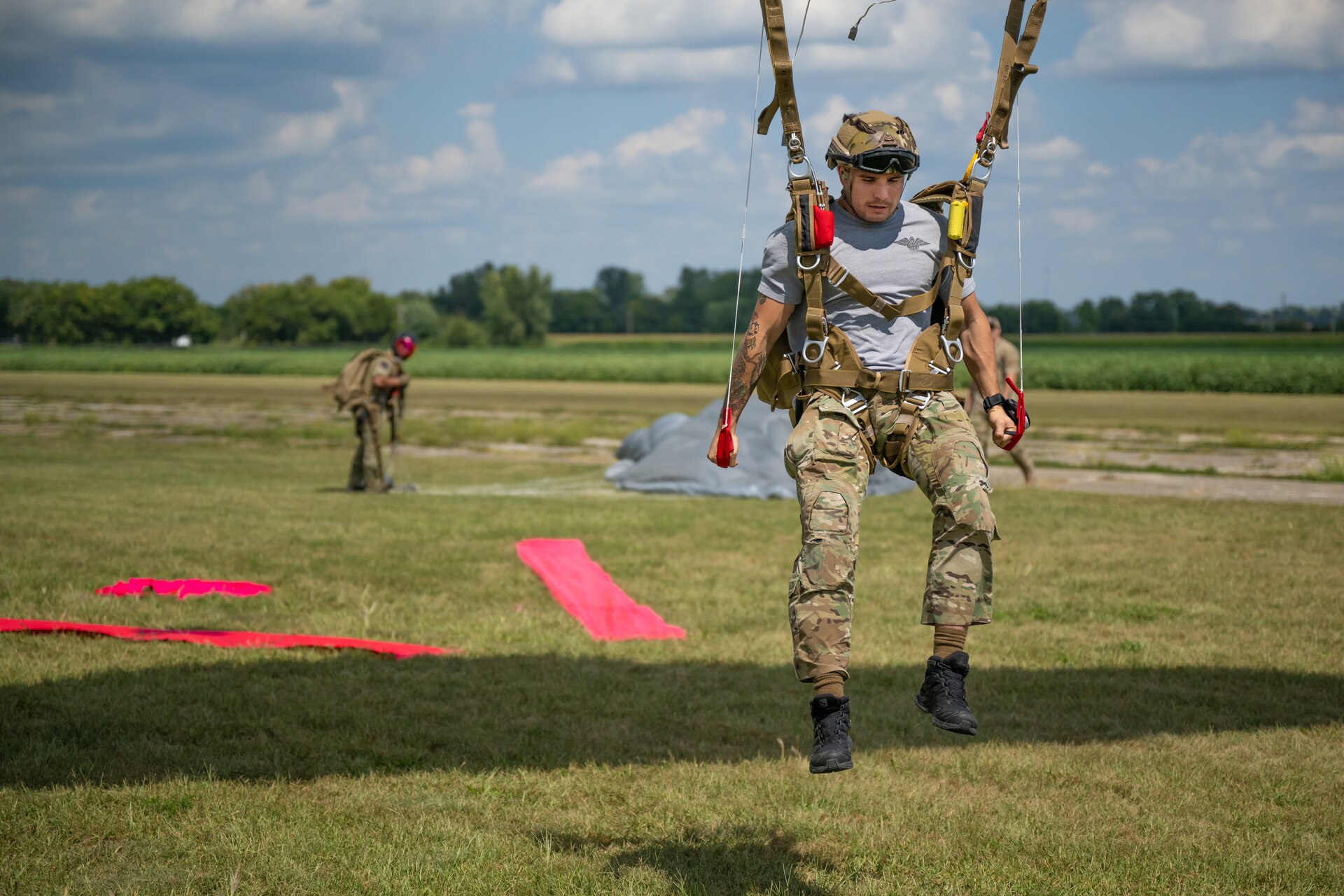 A U.S. Air Force pararescueman executes a precision parachute landing at Freeman Municipal Airport in Seymour, Ind., Sept. 4, 2023, as part of the 2023 PJ Rodeo. The biennial event, which tests the capabilities of pararescue Airmen across the service, was hosted by the Kentucky Air National Guard’s 123rd Special Tactics Squadron. (U.S. Air National Guard photo by Dale Greer)
