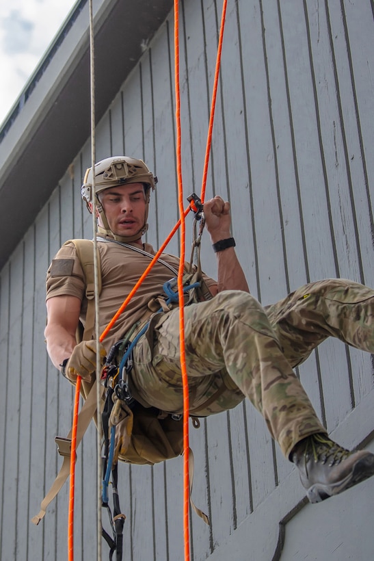 A U.S. Air Force pararescueman executes a precision parachute jump from 5,500 feet at Freeman Municipal Airport in Seymour, Ind., Sept. 4, 2023, as part of the PJ Rodeo. The biennial event, which tests the capabilities of pararescue Airmen across the service, was hosted by the Kentucky Air National Guard’s 123rd Special Tactics Squadron. (U.S. Air National Guard photo by Phil Speck)