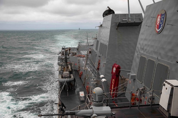 The Arleigh Burke-class guided-missile destroyer USS Ralph Johnson (DDG 114) conducts routine underway operations. Ralph Johnson is forward-deployed to the U.S. 7th Fleet area of operations in support of a free and open Indo-Pacific.