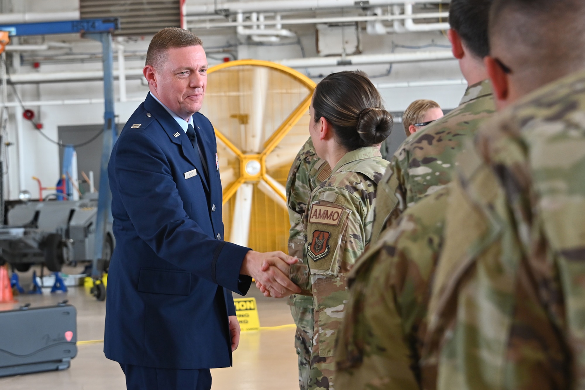 Airmen shake hands