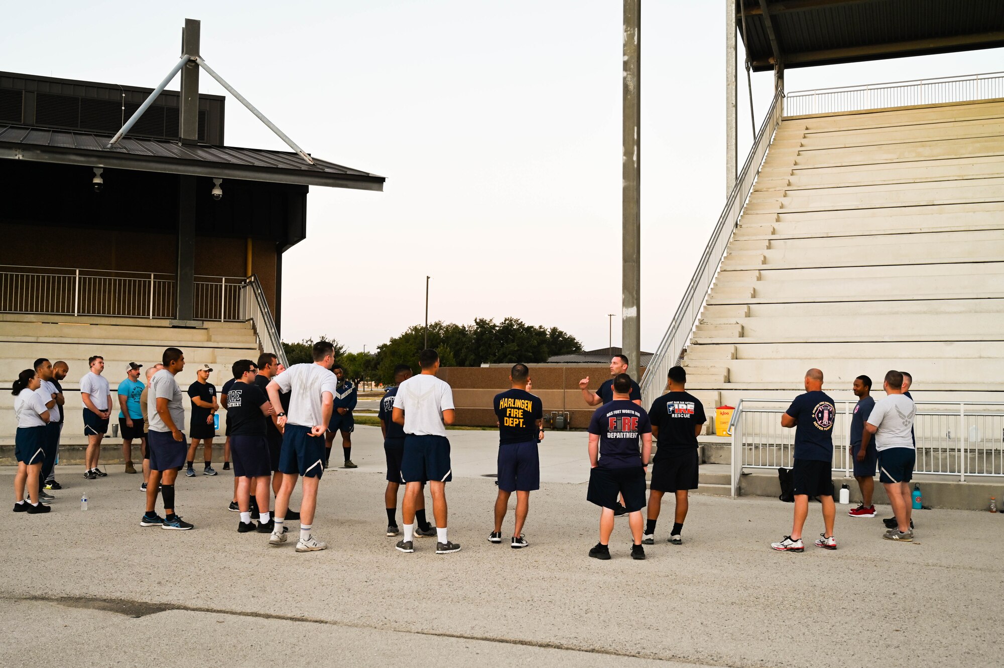 Senior Master Sgt. Joshua Moss, 433rd Civil Engineer Squadron Fire Chief, briefs Airmen before starting the unit’s annual 9/11 Memorial Stair Climb outside the Pfingston Reception Center on Joint Base San Antonio-Lackland, Texas on Sep. 10, 2023.