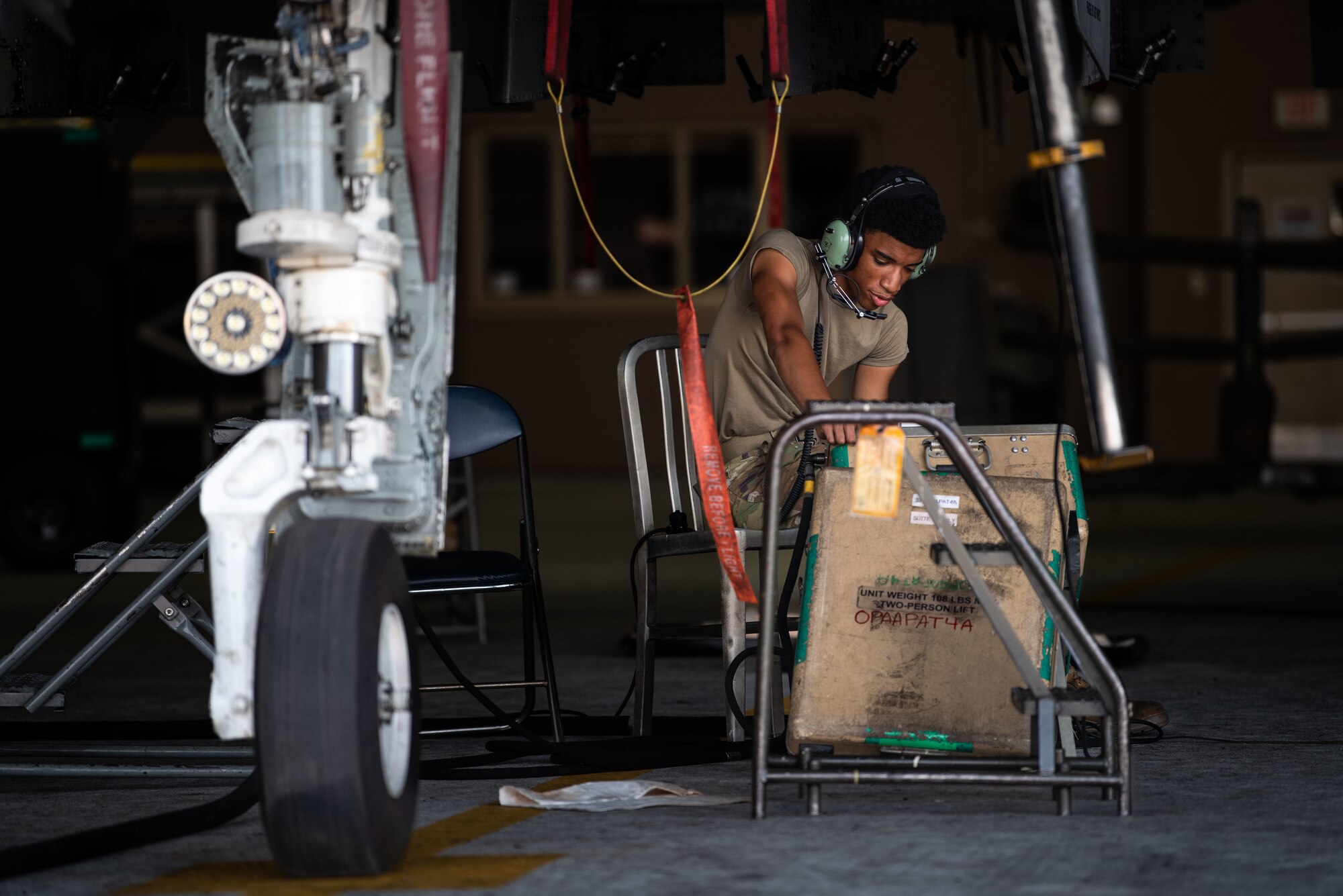 A photo of an Airman inspecting an A-10C Thunderbolt II.