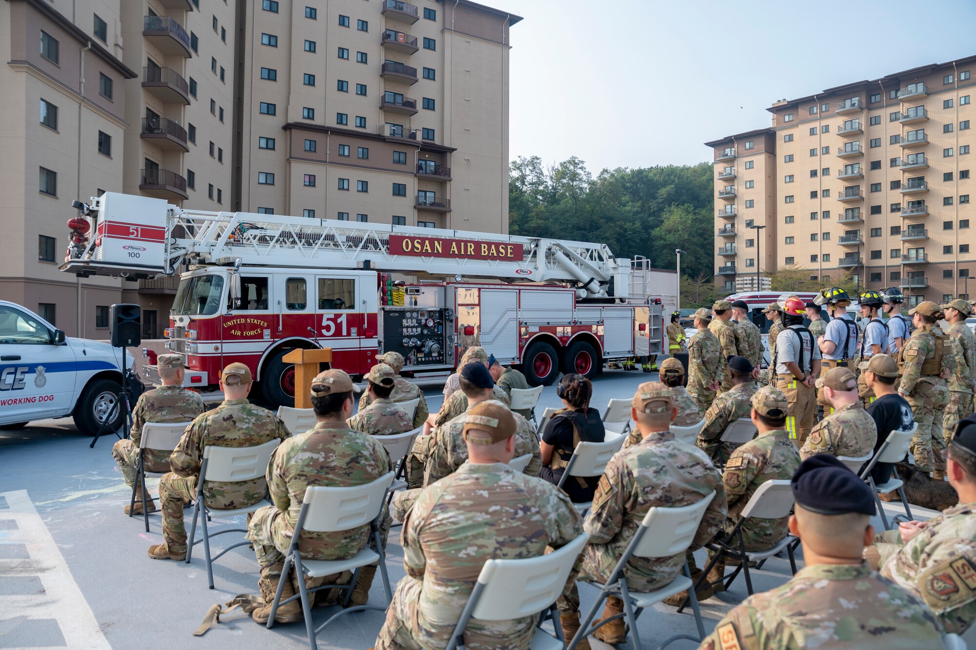 U.S. Air Force Airmen and family members gather for a 9/11 memorial at Osan Air Base, Republic of Korea, Sept. 11, 2023.