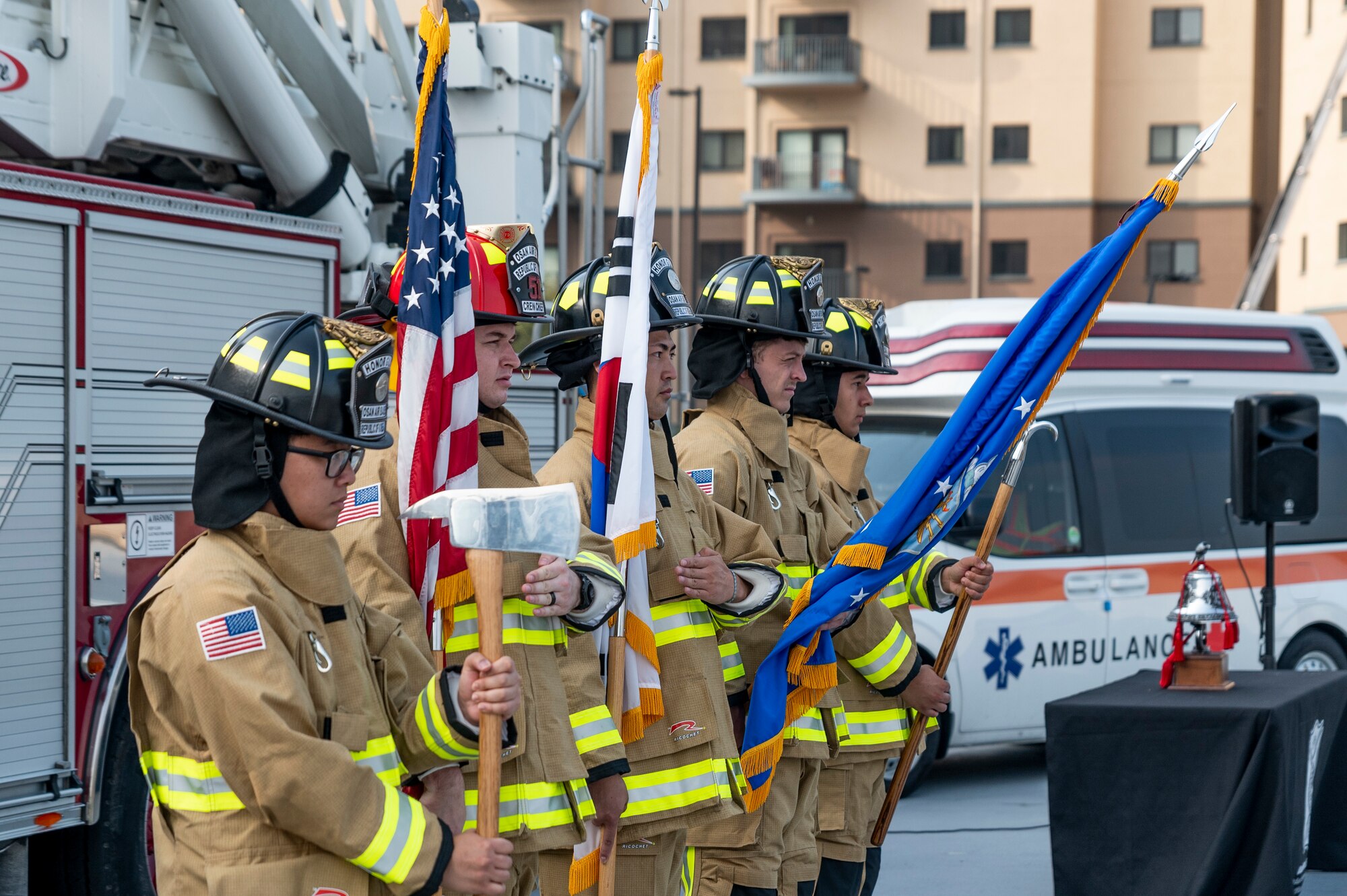 U.S. Air Force firefighters assigned to the 51st Civil Engineer Squadron present the colors during a 9/11 memorial at Osan Air Base, Republic of Korea, Sept. 11, 2023.