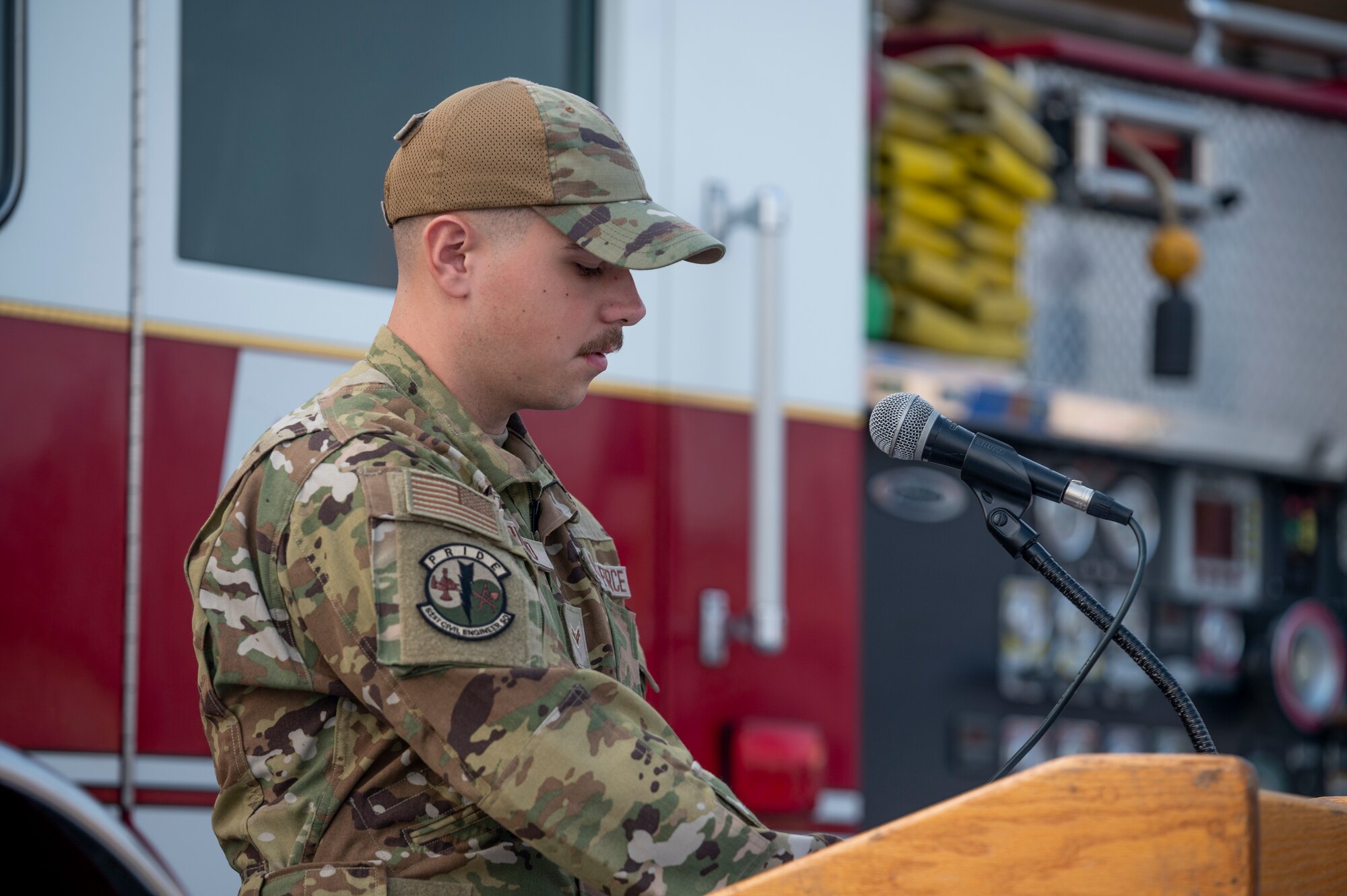 U.S. Air Force Airman 1st Class Domonic Tripodo, 51st Civil Engineer Squadron firefighter, reads the Firefighter’s Prayer during a 9/11 memorial at Osan Air Base, Republic of Korea, Sept. 11, 2023.