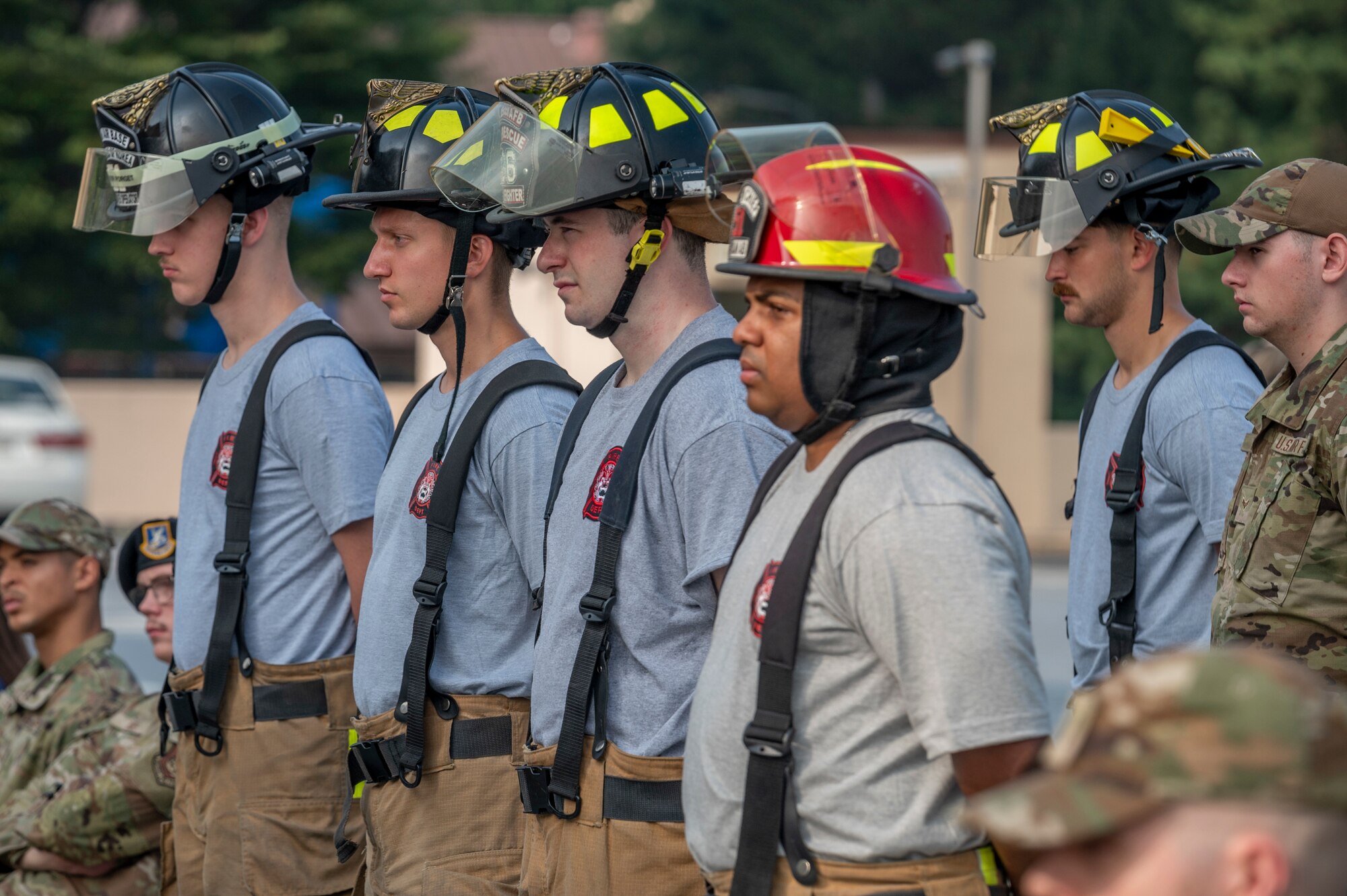 U.S. Air Force firefighters assigned to the 51st Civil Engineer Squadron stand at ease during a 9/11 memorial held at Osan Air Base, Republic of Korea, Sept. 11, 2023.