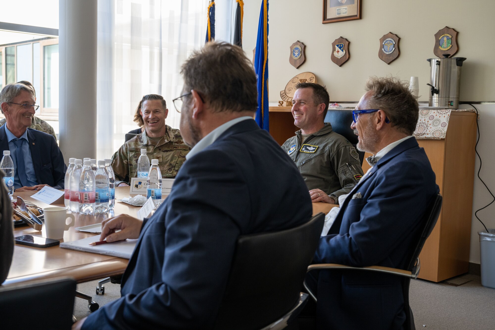 U.S. Air Force Col. Kevin Crofton, 52nd Fighter Wing commander, engages with local German leaders during an information forum