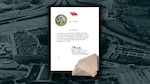 A photo of a letter and a piece of limestone from the Pentagon.