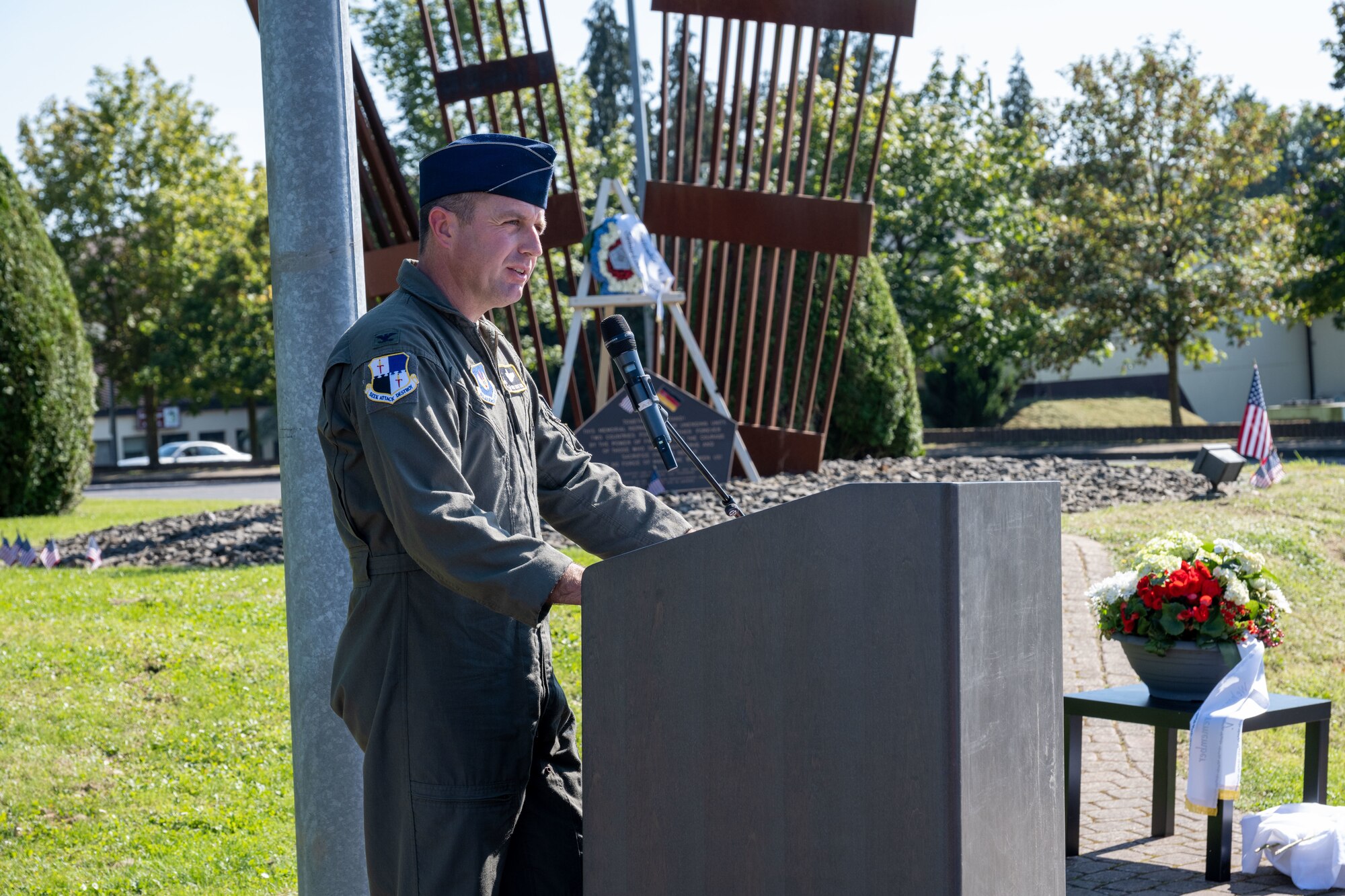 U.S. Air Force Col. Kevin Crofton, 52nd Fighter Wing commander, gives remarks during a 9/11 Remembrance ceremony