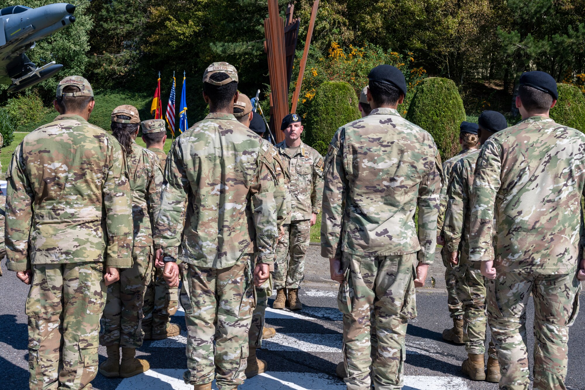 Emergency responders from the 52nd Fighter Wing stand at attention in formation during a 9/11 Remembrance ceremony