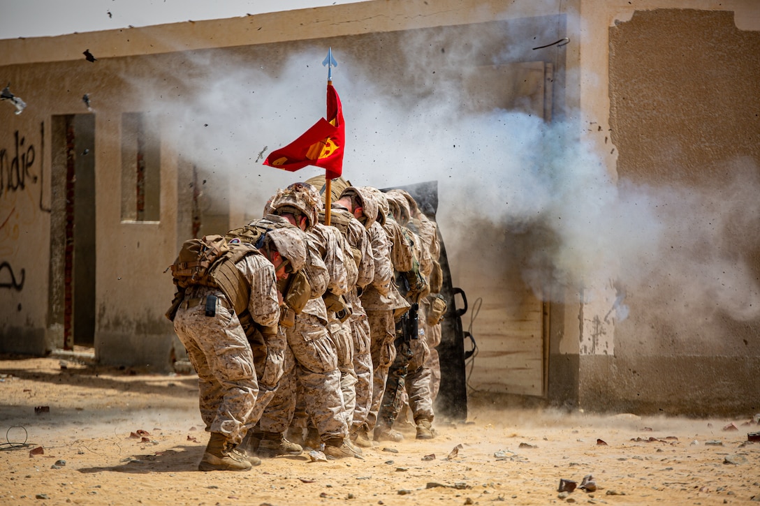 U.S. Marines from 4th Combat Engineer Battalion, 4th Marine Division, Marine Forces Reserve detonate an explosive to conduct breaching techniques with members of partner nation military services during exercise Bright Star 23 at Mohamed Naguib Military Base (MNMB), Egypt, Sept. 7, 2023. Bright Star 23 is a multilateral U.S. Central Command exercise held with the Arab Republic of Egypt across air, land, and sea domains that promotes and enhances regional security and cooperation, and improves interoperability in irregular warfare against hybrid threat scenarios.