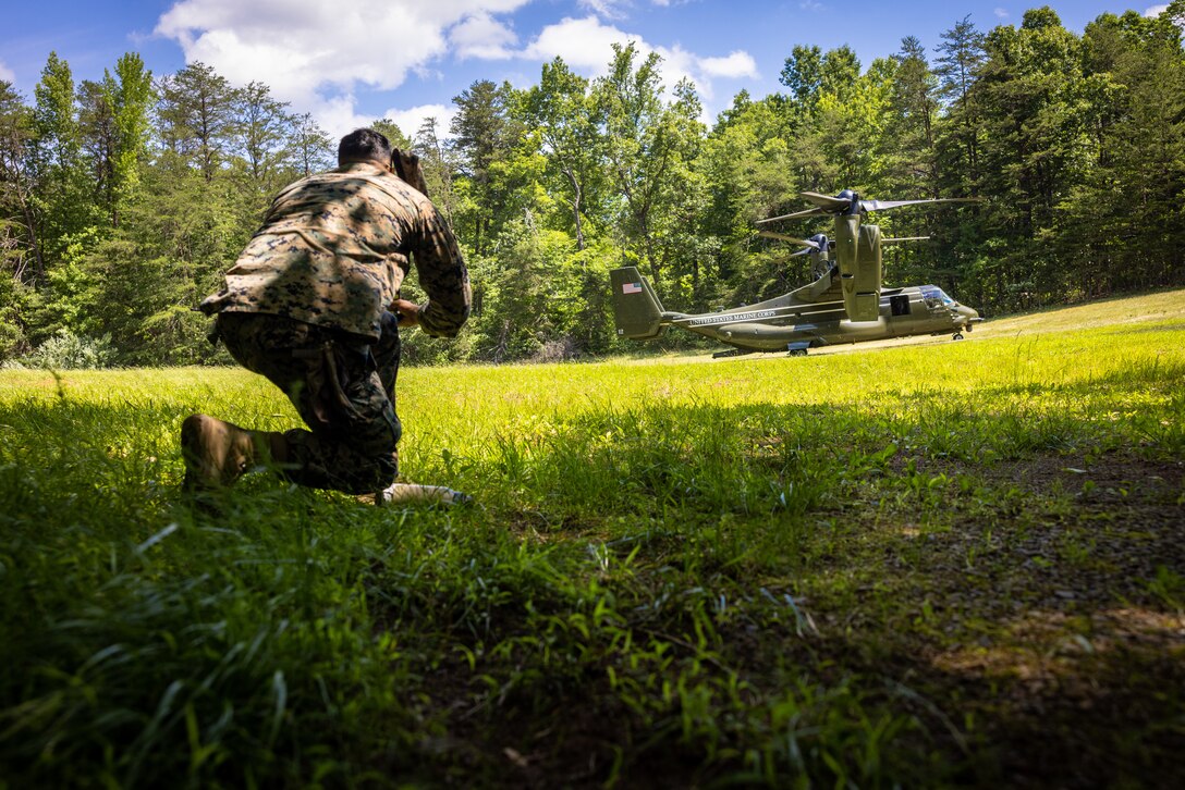 U.S. Marines from 4th Civil Affairs Group (4th CAG), Marine Corps Advisor Company-A (MCAC-A), and 4th Air Naval Gunfire Liaison Company (4th ANGLICO) conduct an air insert during a simulated community relations exercise while participating in Military Operations on Urban Terrain on Marine Corps Base Quantico, Virginia, June 13, 2023. This wargame event focused on Naval Engagement concepts with the goal of building and maintaining regional maritime access and influence at echelon across the phases of competition, crisis, and conflict. The wargame was the initial training event within the larger Force Headquarters Groups, Marine Forces Reserve, Naval Engagement Exercise 23 (NEX 23) intended to increase combat readiness and validate the Naval Engagement Concept in support of Force Design. (U.S. Marine Corps photo by Lance Cpl. Joaquin Dela Torre)