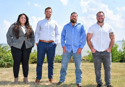 IMAGE: The Naval Surface Warfare Center Dahlgren Division MK38 MOD4 Gun Weapon Systems Console Design and Integration Team, consisting of team members (pictured left to right) Christie Cons, Ryan Cervino, Joshua Assur and John Holder with the Integrated Engagement Department, was selected for the Fiscal Year 2023 Third Quarter Program Executive Office Integrated Warfare Systems Excellence Awards. Not pictured are James Carsola and Luke Delozier.