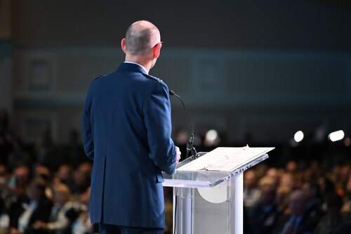 Rear view of Richardson speaking at AFA