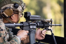 U.S. Marines with Marine Corps Security Forces Regiment (MCSFR) conduct live-fire exercise at Naval Weapons Station Yorktown, Virginia, September 7, 2023. The SMASH 2000L is a high-tech individual fire control system with sophisticated ballistic processing that can recognize, track, and engage unmanned aerial systems (UAS) and ground targets with unmatched precision. Marines with MCSFR trained with the SMASH 2000L to improve capabilities of engaging and destroying UAS and other ground-based targets. (U.S. Marine Corps photo by Sgt. Hannah Adams)