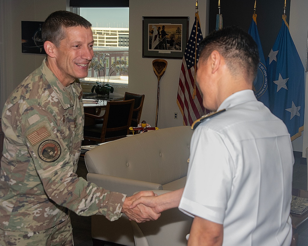 JFHQ-DODIN Commander, Lt. Gen. Robert Skinner, greets Rear Admiral Park, Kyu-Paek, Commander Republic of Korea ROK Cyber Operations Command.